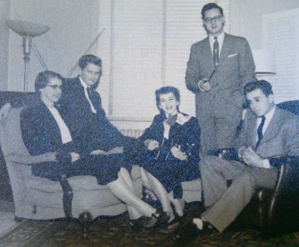 From 1954. From left to right, Clara Cassidy (aka Deedee), John Cassidy, Isabel Cassidy (playing ukulele), Lew Cassidy (standing), and Hugh Cassidy.