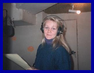 CHECKING THE HEADPHONE MIX: Eva at Chris Biondo's studio in Rockville, getting ready to record with "Method Actor" (late 1980's). 