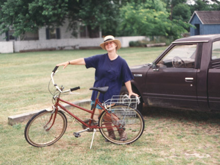 Eva and her truck: Getting ready for a bike trip.