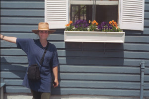 TOURING ANNAPOLIS: Eva's German friend Wiebke Sander took this snapshot of Eva in front of a house in Annapolis, Maryland, in 1994.  "Eva was showing me narrow alleys with nice little homes in different colors. One of them had this beautiful flowerbox that Eva liked a lot."   Pansies were some of Eva's favorite flowers.