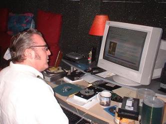 Mark Hagen sitting at a computer looking at this web site